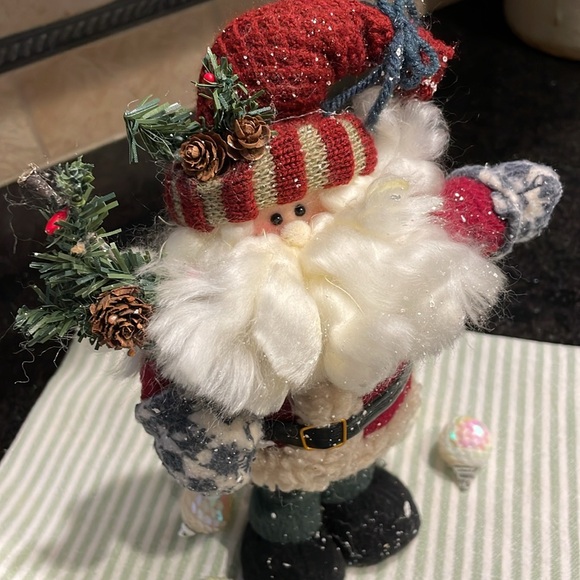 Father Christmas stands proudly with his fluffy beard, pine branches and snow - Picture 7 of 10